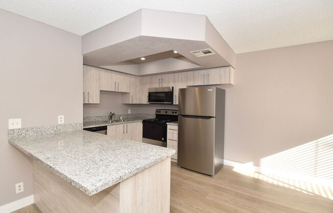 Stunningly remodeled 2-bedroom, 2-bath condo located at Rock Springs Vista.