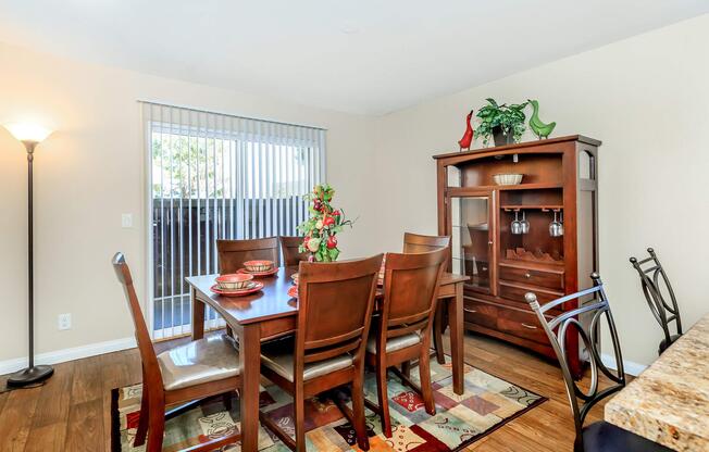 a living room filled with furniture and a window