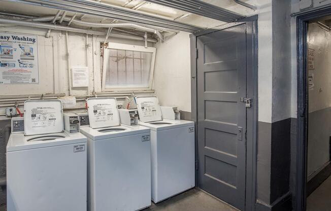 a white refrigerator freezer sitting inside of a kitchen