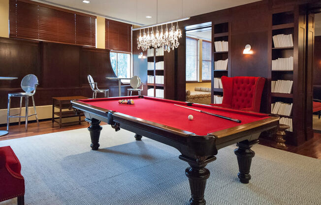 Newark Apartments for Rent-Eleven80 Apartments Game Room With Seating And Billiards Table