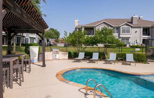 our apartments have a large pool and patio