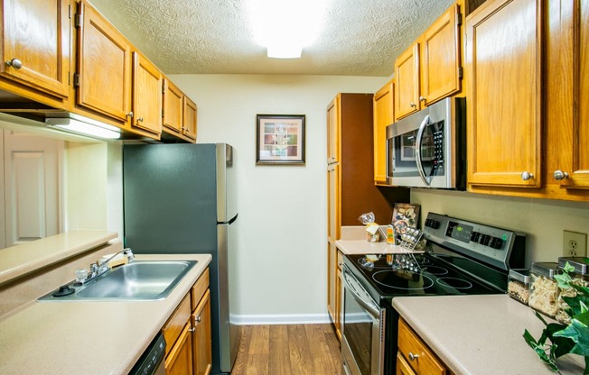 Kitchen with Stainless Steel Appliances at Best Apartments in Gwinnett County