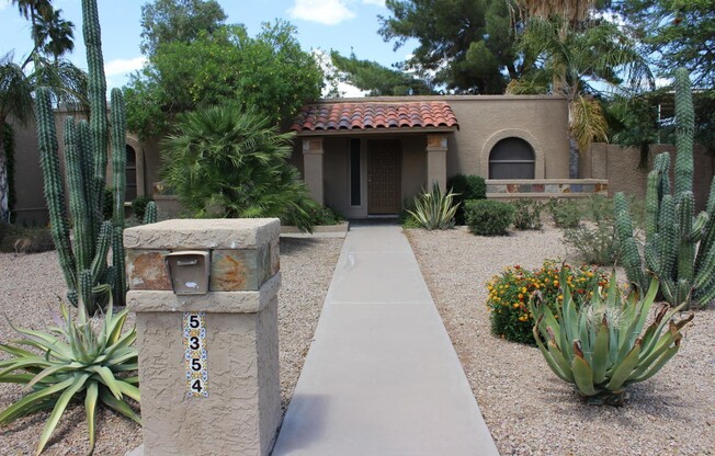 GORGEOUS 3 BEDROOM, 2 BATHROOM HOME WITH PEBBLE TECH POOL IN COVETED SCOTTSDALE LOCATION!