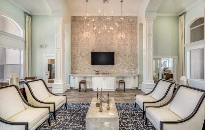 Office lobby area with tv and lounge seating