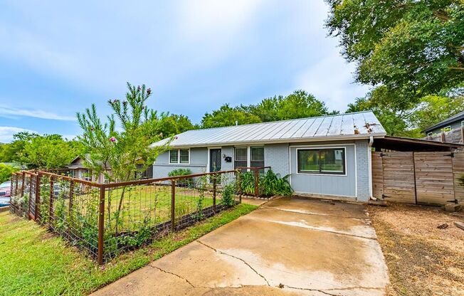 Stylish Updated Home: Gourmet Kitchen, Expansive Deck, and Private Fenced Yard—Your Ideal Retreat Awaits!