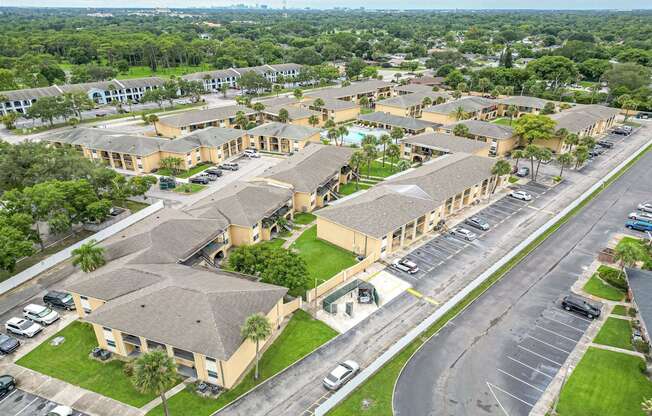 an aerial view of a neighborhood of houses and streets