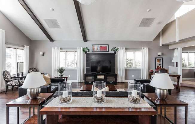 A living room with a fireplace and a large couch.