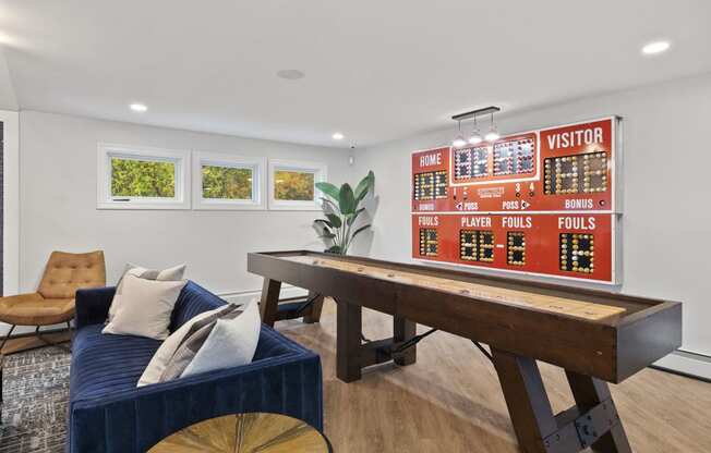Game Room With Shuffle Board at Heritage at the River, Manchester, New Hampshire