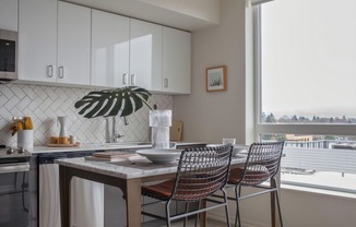 Kitchen with quartz countertops and stainless steel appliances