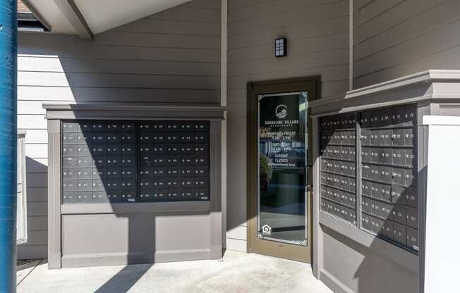 a door to a building with a display of wine glasses  at Shoreline Village, Richland, WA