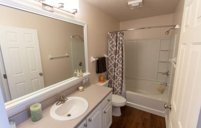 This is a photo of the primary bathroom in the 1242 square foot, 2 bedroom, 2 and 1/2 bath Spinnaker floor plan at Nantucket Apartments in Loveland, OH.