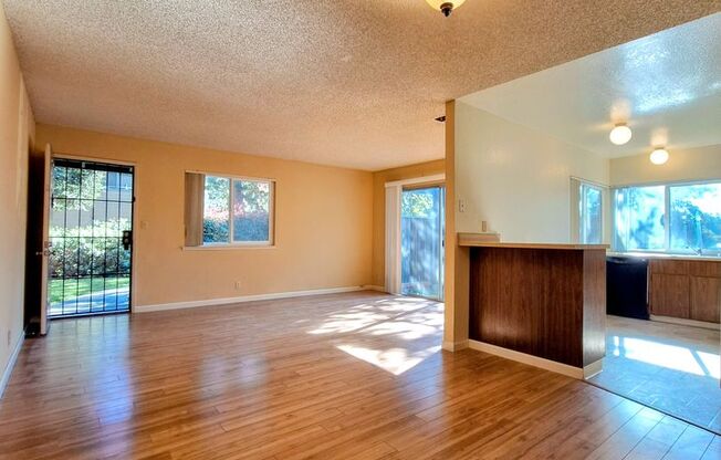 Spacious 2bd First Floor Condo W/Private Patio, Attached Garage, & Private Laundry Room