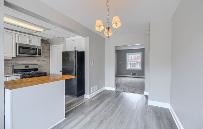 3 Bed 1 Bath Rowhome with OFFSTREET PARKING AND OUTSIDE STORAGE