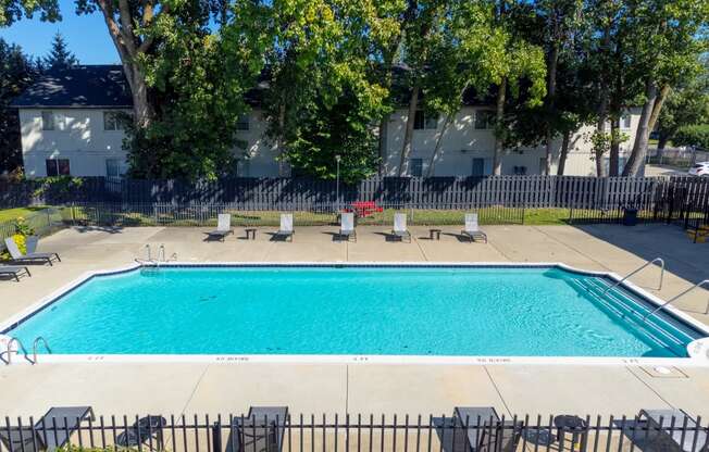 Heated Pool at Knottingham Apartments , MI