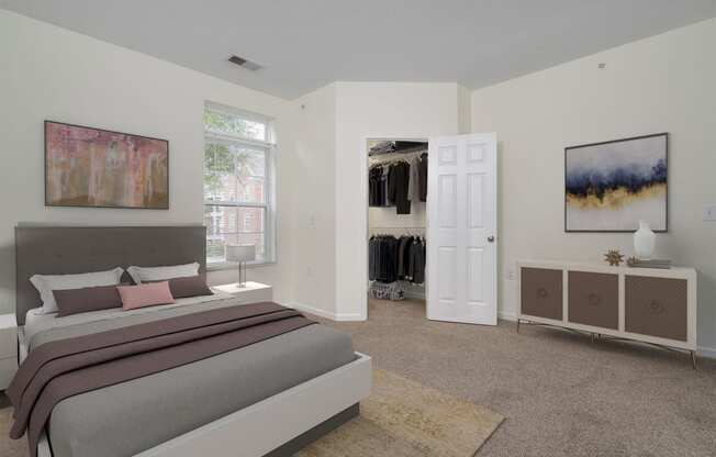 a bedroom with a bed and a closet