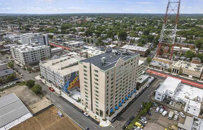 an aerial view of a large white building with a black roof  at The Icon, Virginia