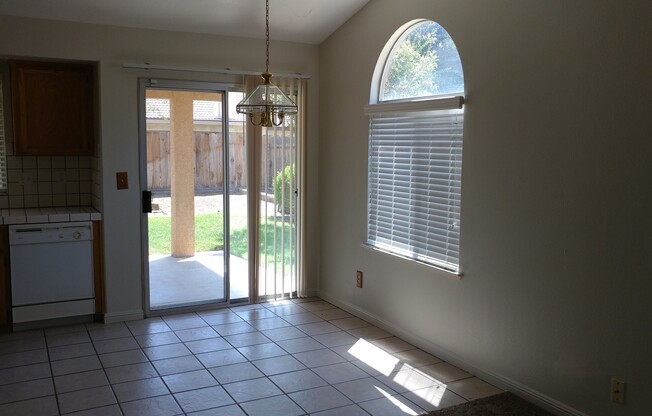Big backyard on this NW home, Central Unified Schools. Close to shopping and HWY 99.