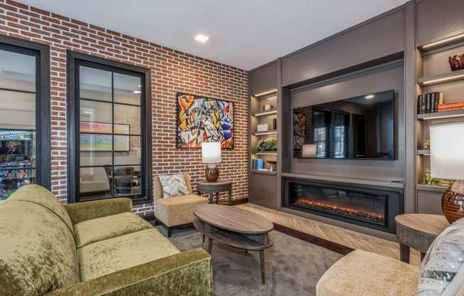 a living room with a couch and a fireplace