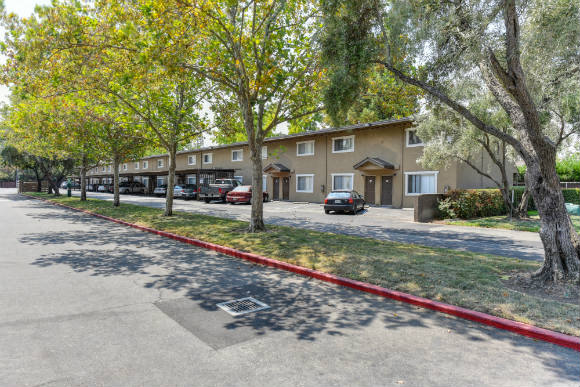 Community Exterior with Street, Grass and Trees