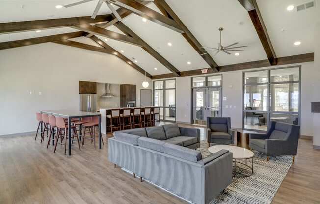 Clubhouse with seating and deluxe kitchen for entertaining at Ascend at Woodbury new luxury apartments in Woodbury MN 55129