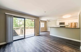 hardwood floors with floor to ceiling windows in select apartments.