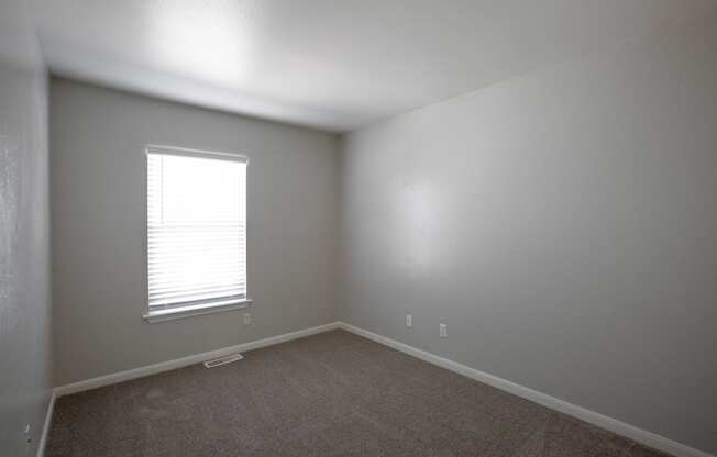 Bedroom with Carpet at The Bluffs at Tierra Contenta Apartments in Santa Fe New Mexico