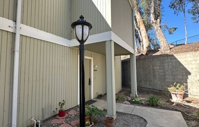 Warner Center 3+2 bedroom townhome with a private garage