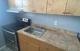"Modern Comfort: Newly Updated 2BR/1BA, Vinyl Tile Flooring, Spacious Living, Near Downtown Miami!"