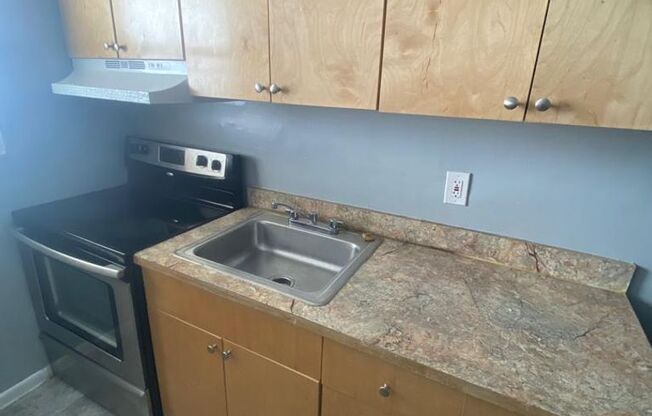 "Modern Comfort: Newly Updated 2BR/1BA, Vinyl Tile Flooring, Spacious Living, Near Downtown Miami!"