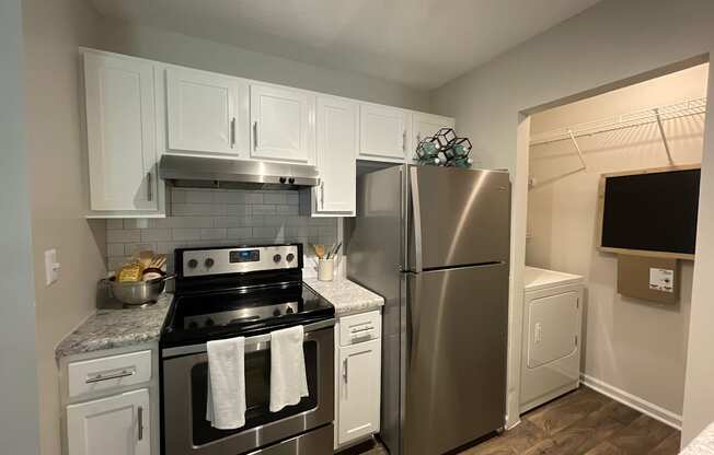 modern kitchen featuring stainless steel appliances at Palmetto Place, Fort Mill