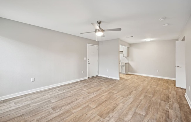 Living room area in the D5 floor plan at Windridge On The Parkway Apartments in Dallas, TX