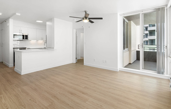 Living Room with Balcony and Hard Surface Flooring