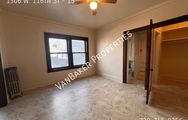 1306 W 116 ST