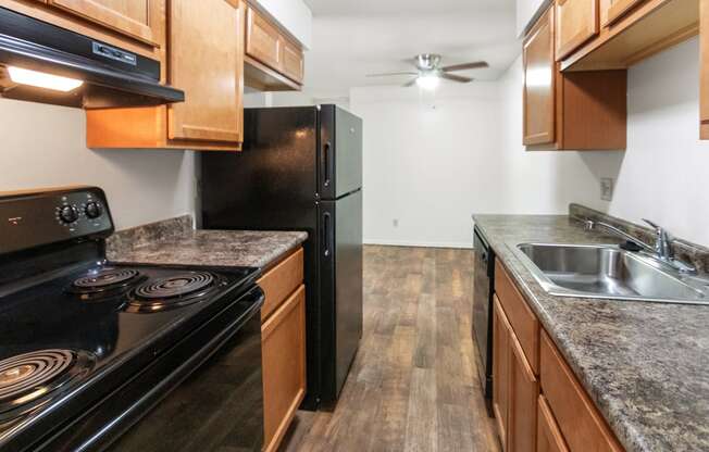 This is photo of the kitchen in the 560 square foot 1 bedroom apartment at Aspen Village Apartments in Cincinnati, OH.