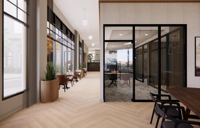 Brighlty lit resident lounge with ample social seating.