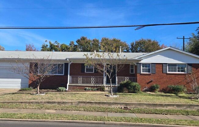 Mid-town red brick ranch home with 3 bed, 2 full bath & 2 car garage on corner lot.