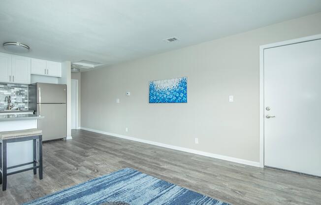 a bedroom with a bed in a room