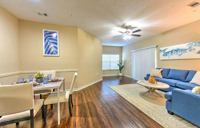 a living room with a couch and a table  at Ocean Park, Jacksonville Beach, FL, 32250