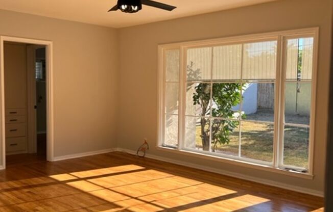 South of Conant Home with 3 Bedrooms, 1 bath and beautiful Hardwood Floors!