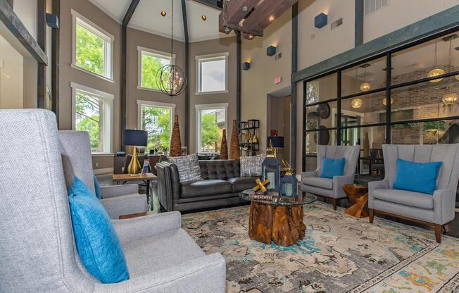 a living room filled with furniture and a fireplace