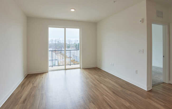 Living Room with Balcony and Hard Surface Flooring