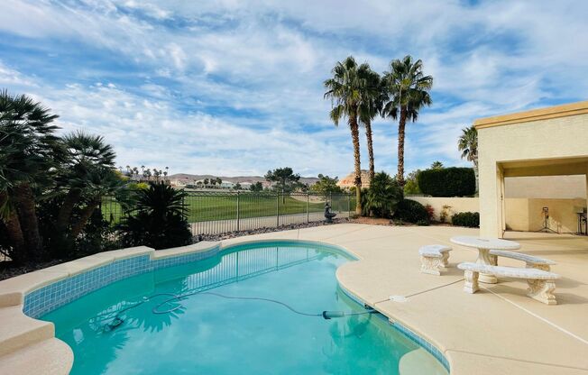 Single story 2,055sqft home with gorgeous golf course view inside Guard gated Rhodes Ranch community.