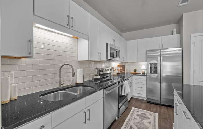 Designer Kitchen with Stainless Steel Appliances at Spinning Mill Lofts, Clayton, 27520