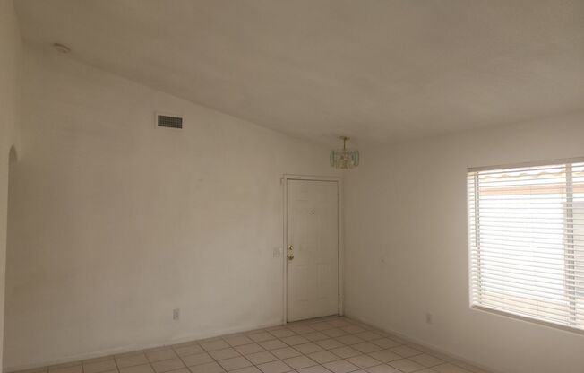 Single story with tile flooring and gas fireplace.