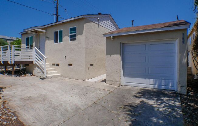 Remodeled single family home with washer/dryer hookups,  patio and garage!