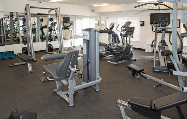 fitness room with weights at Urban Park I and II Apartments, St Louis Park, MN, 55426