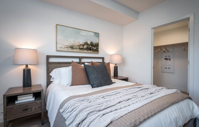 The Byway | Model #105 Beautiful Primary Bedroom Shown With Queen Sized Bed and Two Nightstands