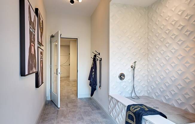 a bedroom with a bed and a hallway with a door to a closet at Dey & Bergen, Harrison, New Jersey