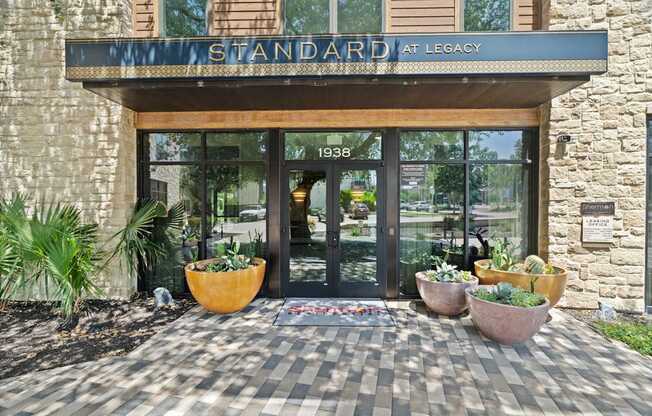 The front of a building with a sign that says