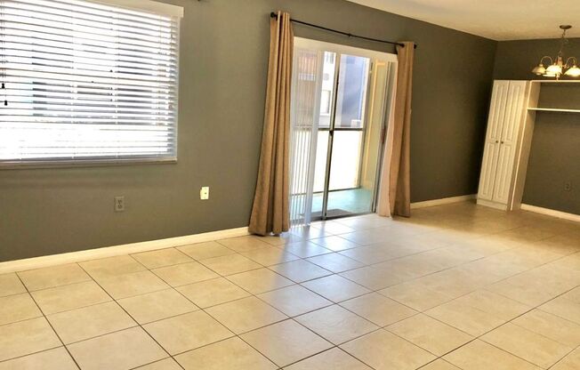 MOVE IN JUNE! WATER INCLUDED! In Windmill Point- 1st floor 2X1 condo with all tile floors!! Nice SS/black appliances! Open dining/living area!